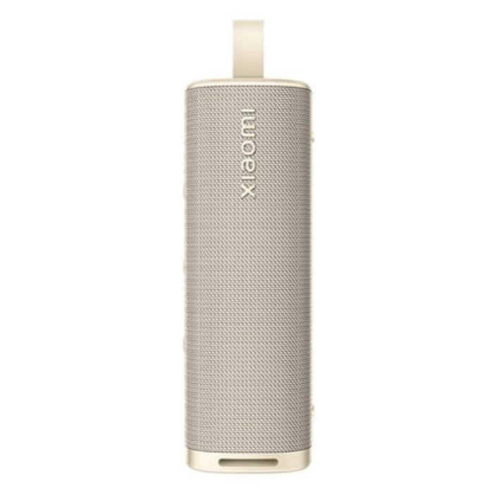 Altavoz Bluetooth portátil beige con rejilla de tejido